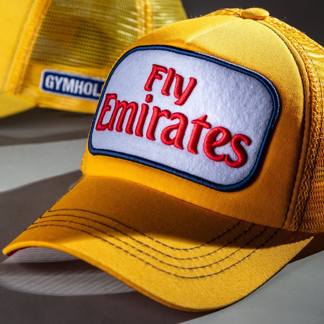 Fly High in Style: The Must-Have Fly Emirates Caps by Caliente - Caliente